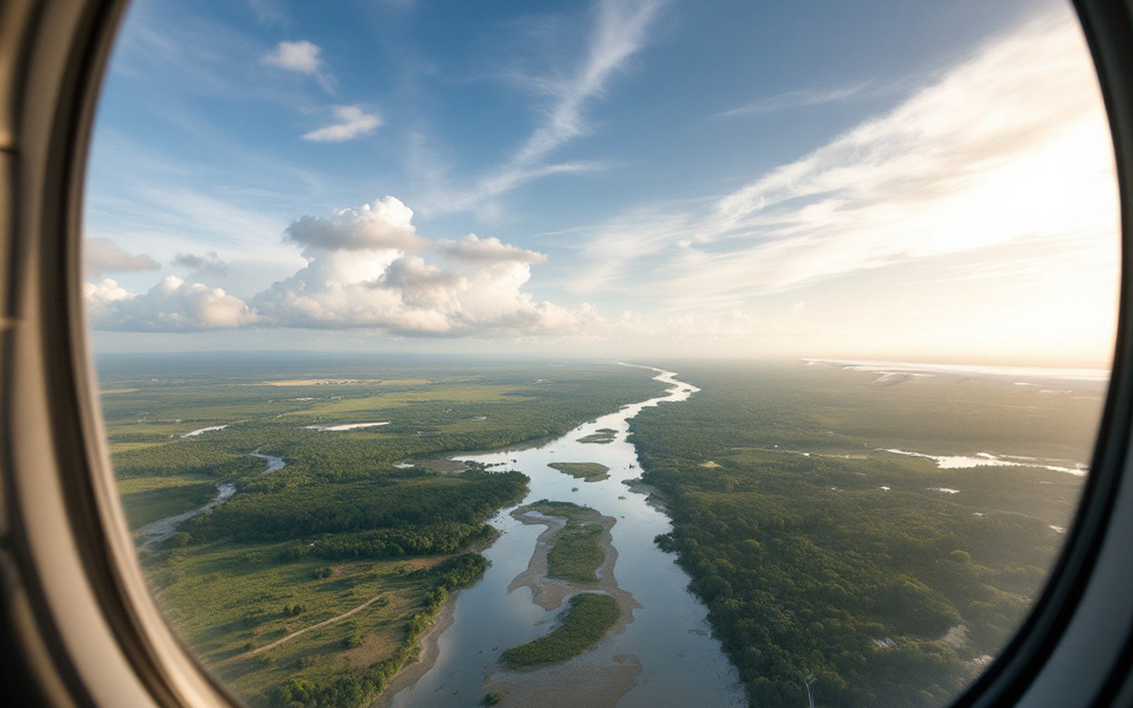A river and floodplain seen through an aircraft window